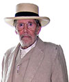 Peter O’Toole during a wardrobe fitting wearing a Brent Black hat for a movie role.