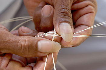 weaving straw hats