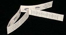 Paper Tape Measure Against Black